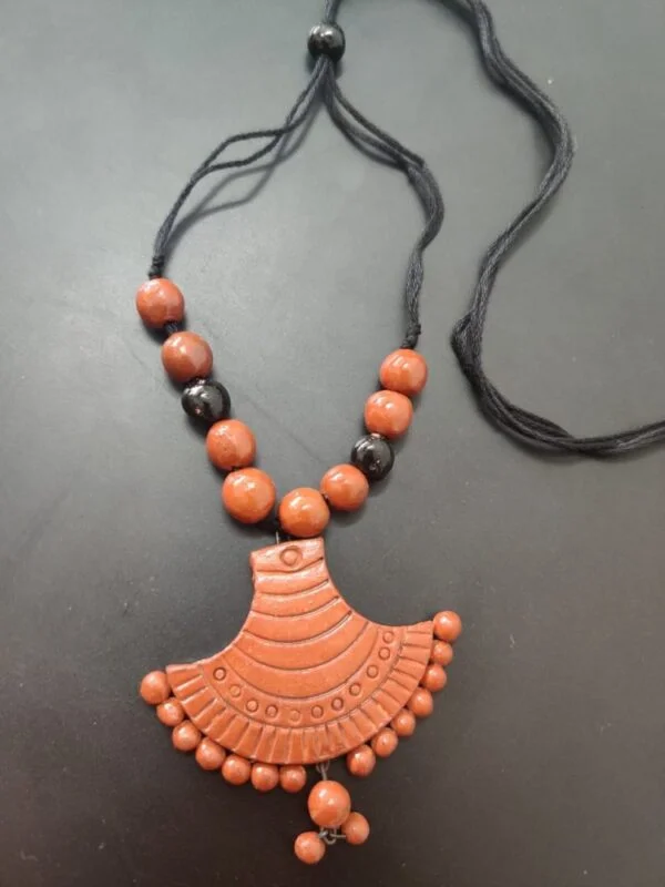 Terracotta Fancy Pendant With Black Beads |